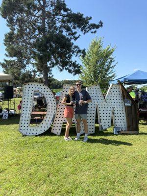 Us in front of the "DAM" sign.