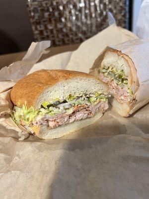 BYO: sourdough roll, Sausalito turkey, pepper house sauces, lettuce, onion, extra pickle