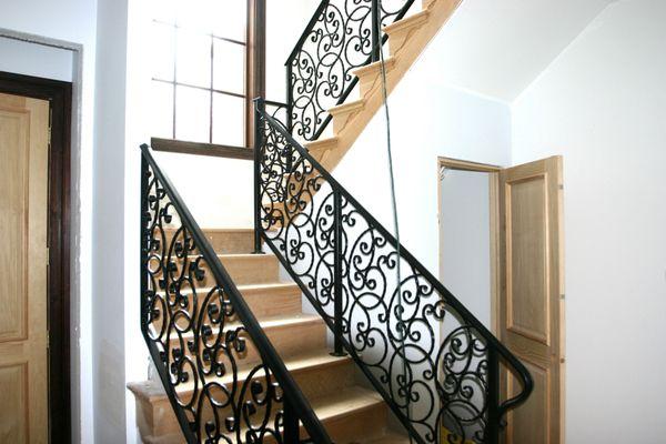 black metal stairway railing.