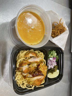 Khao soi with grilled chicken for to go.