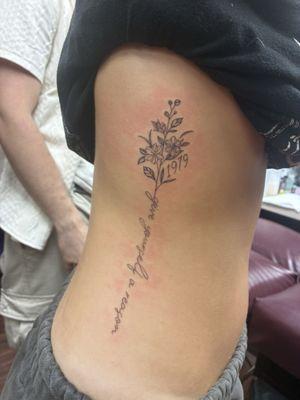 The tattoo is not crooked, I was turned a little while standing. But the line work and shading is amazing!!