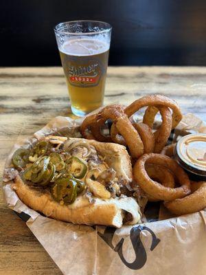 Founders Favorite cheesesteak and Shiner Bock