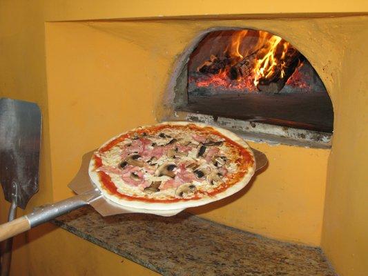 Our Wood Fired Pizza is faithfully crafted adhering to the ancient tradition recipe and the way Authentic Pizza is Made in Italy.