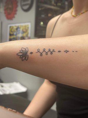 Purple Monkey Tattoo and Body Piercings