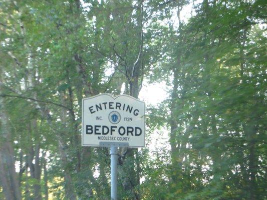 Entering Bedford: Town of Bedford, Middlesex County sign at the Carlisle/Bedford line. This has "MIDDLESEX COUNTY" on both sides.