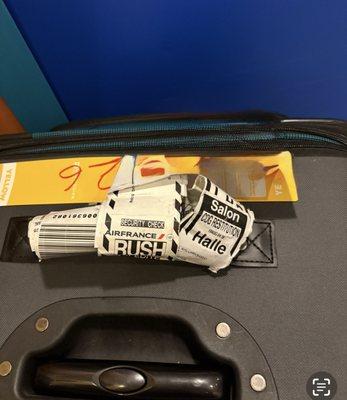 Tags on my luggage. It has more air miles than me.