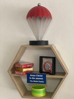 The bookshelf sign created by Trophy Shop.