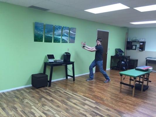 My son modeling with the new paint for the office