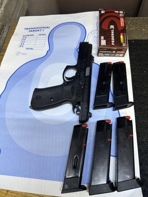 Practicing safe gun handling at Westside Gun Range with my CZ75 SPO1 9 MM pistol. Here slide open no magazines in pistol.