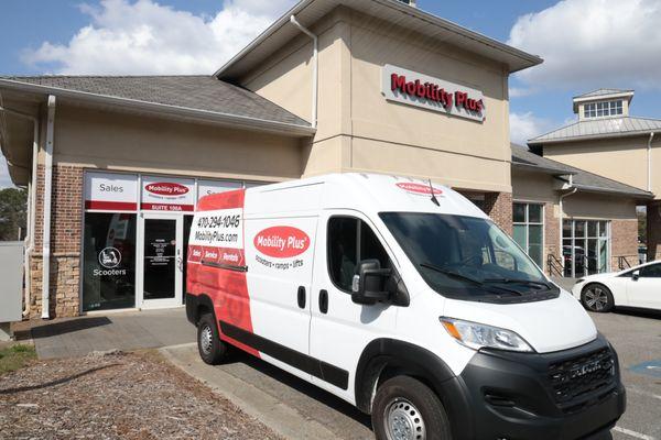 Mobility Plus Lawrenceville storefront and service van offering local delivery, setup, and mobility equipment rentals and repairs.