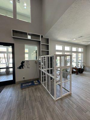Cat enclosure in lobby.