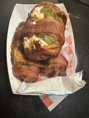 Ridiculously good. Stuffed peppers with cream cheese and wrapped in bacon. Not spicy just delicious