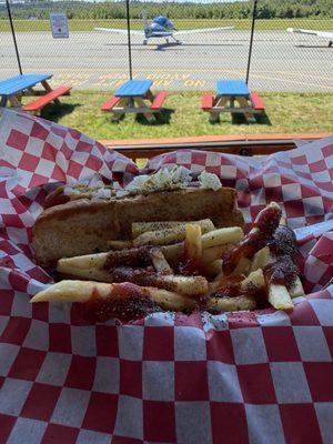 Beautiful day to sit out, watch the planes and enjoy a great dog and fries