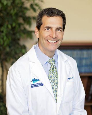 Joshua A Siegel, MD