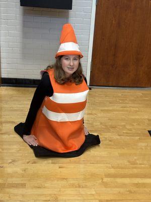 my grandma ran over a traffic cone in the parking lot.