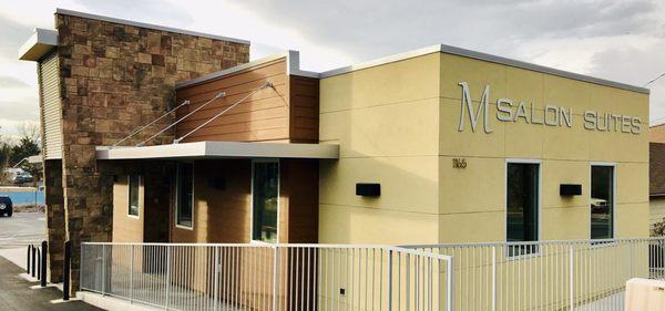 The M Salon Suites has nice urban design with plenty of free paved parking to the west of the building.