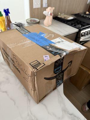 Crushed box labeled fragile