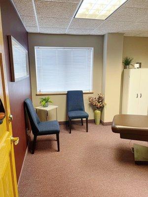 Enjoy a welcoming and cozy waiting area before your expert laser or electrolysis treatment in St. Cloud!