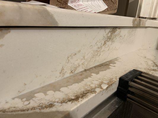 The slab in relation to backsplash starts like this