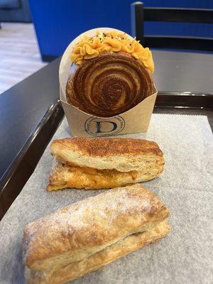 Guava pastry, ham and cheese pastry and New York style roll filled with pumpkin.
