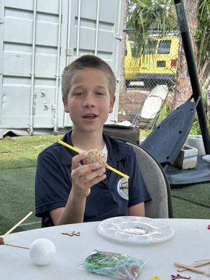 My son during a hands on science class.