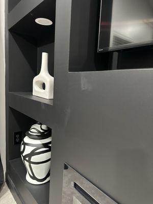 I have attached photos without the lights on to assure you these are not glares, but primer bleeding through the surface.