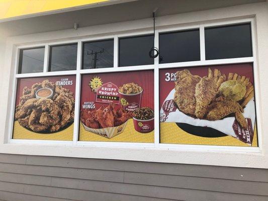 Fried chicken, chicken wings, gizzards, potato wedges, biscuits