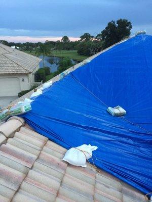 Tarping is one of the many things that we do