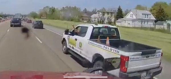 obscene/ vulgar gesture from driver of company truck.