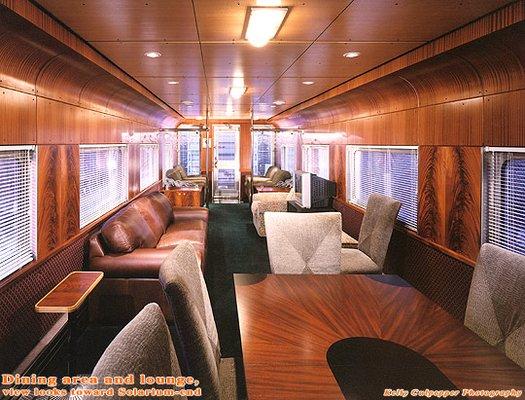 Beautiful ribbon and burled mahogany throughout