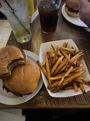 Chicken slider on top of the hamburger sliders, fries and margarita