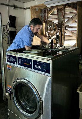 Commercial washing machine repair. Water supply valve replacement.