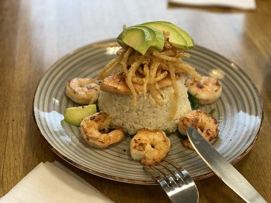 The Postal Special (hacked menu): Avocados over fried crispy onions, salmon, and white rice sits over sautéed spinach with seasoned shrimp.