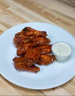 Bone-in wings with hot sauce