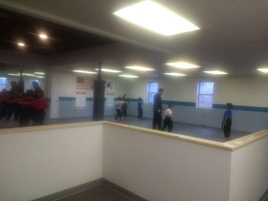 Class broken up by skill levels, with four different adult blackbelt instructors.