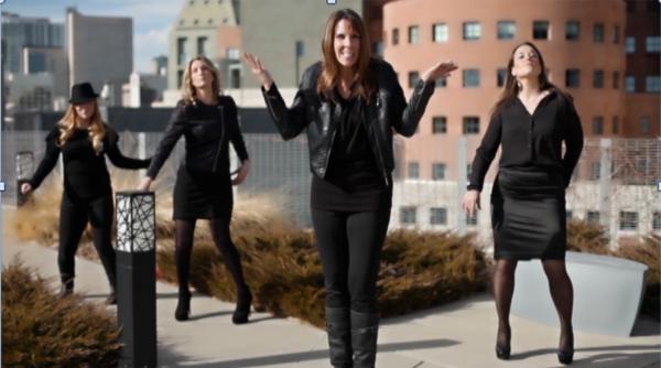 A still from a rap video in which a middle-aged mom attempts to convince her teenage son that she's "Still Got It." Uh...yeah.