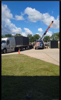 Liberty Towing unloading the containers