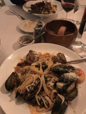 Spaghetti with seafood in red sauce.