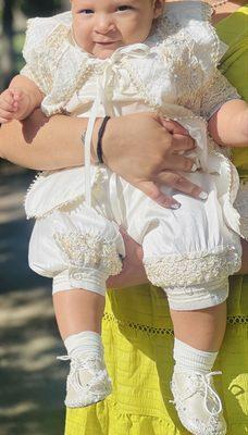 Shoes that match and have embroidery.