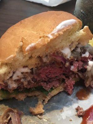Raw bloody soaked bun SOB burger...Signature Burger???! Not so much!!