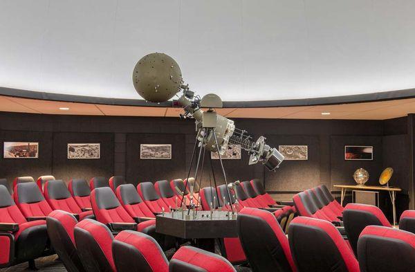 Projector in the middle of full dome planetarium at Coshocton High School
