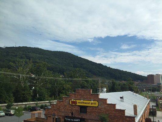 I would rate the door about 90% sound blockage of the train. The view makes up for any disturbance it might have been.