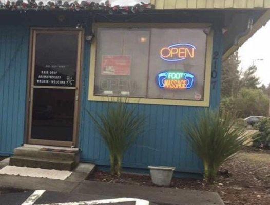 This building is at the very back of the parking lot.