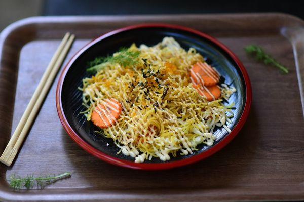 Yakisoba : Japanese noodle stir-fry with cabbage, carrot, mayo,eel sauce and seaweed.