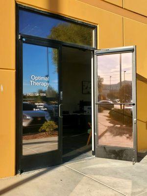 Optimal Therapy door and building