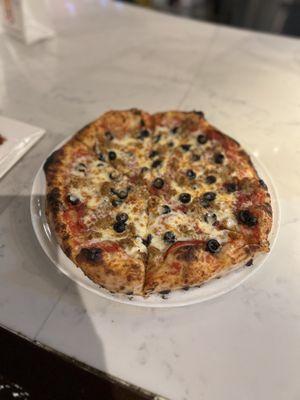 New York style pepperoni, sausage, and olives