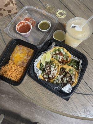 4 Street Tacos with rice and beans with a frozen margarita to go!!
