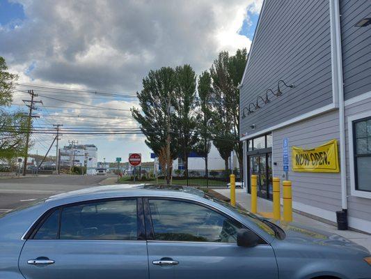 An ugly storefront, with an uglier view across the street.