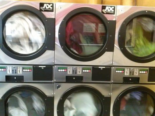 It's a damn shame that the only place I can come and wash all of my damn nasty clothes in my damn house is on the corner from my