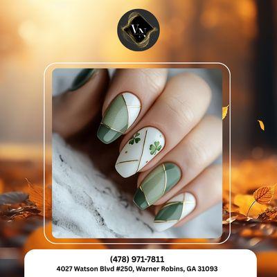 Green nails with clover design -- lucky, fresh, and full of cheerful fall energy. Book your charming mani today!